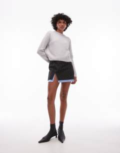 Model wearing Knitted crew with raglan and exposed seam jumper in light grey