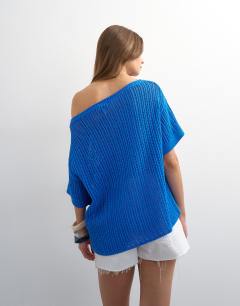 Model wearing Knitted crochet off the shoulder drape top in blue