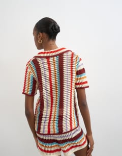 Model wearing Knitted crochet stripe co-ord shirt in burgundy