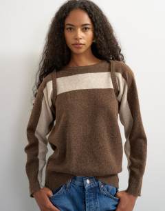 Model wearing Knitted detachable wrap scarf stripe jumper in brown
