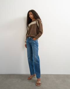 Model wearing Knitted detachable wrap scarf stripe jumper in brown