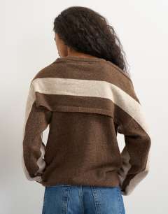 Model wearing Knitted detachable wrap scarf stripe jumper in brown