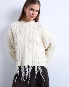 Knitted distressed cable jumper in ivory