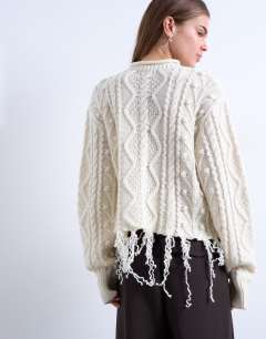 Model wearing Knitted distressed cable jumper in ivory