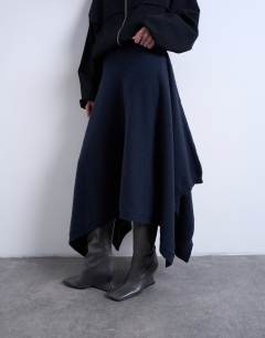 Model wearing Knitted draped skirt in navy