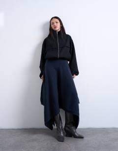 Model wearing Knitted draped skirt in navy