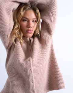 Model wearing Knitted easy ribbed relaxed cardigan in oat