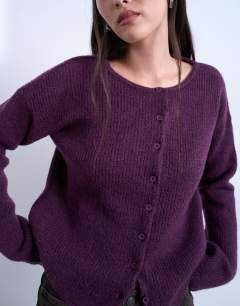 Model wearing Knitted easy ribbed relaxed cardigan in plum