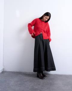 Model wearing Knitted easy ribbed relaxed cardigan in red
