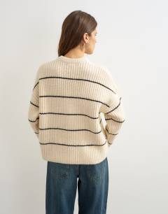 Model wearing Knitted easy stripe jumper in ivory