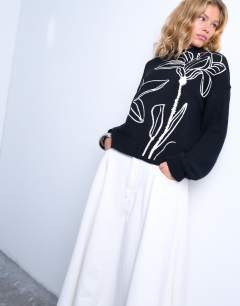 Model wearing Knitted embroidered floral jumper in mono