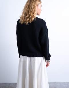 Model wearing Knitted embroidered floral jumper in mono