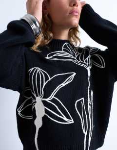 Model wearing Knitted embroidered floral jumper in mono