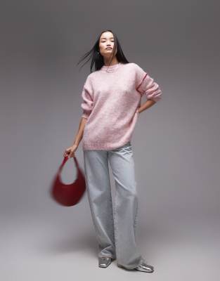 knitted exposed contrast seam oversized sweater in light pink