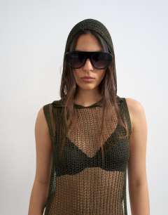 Model wearing Knitted fine hooded top in metallic khaki 
