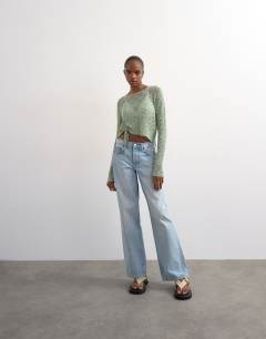 Model wearing Knitted fine long sleeve ruched top in sage