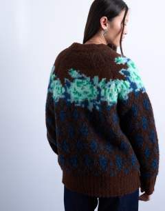 Model wearing Knitted flower and argyle jumper in multi