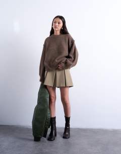 Model wearing Knitted fluffy exposed seam easy jumper in brown
