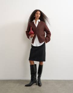 Model wearing Knitted fluffy eyelash cardigan in chocolate