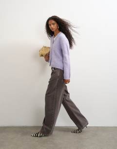 Model wearing Knitted fluffy eyelash cardigan in periwinkle