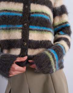 Model wearing Knitted fluffy multi stripe cardigan