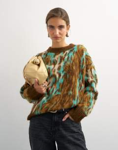 Model wearing Knitted fluffy relaxed fit brushed animal crew neck jumper in brown