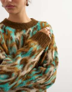 Model wearing Knitted fluffy relaxed fit brushed animal crew neck jumper in brown