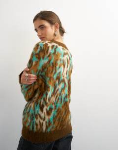 Model wearing Knitted fluffy relaxed fit brushed animal crew neck jumper in brown