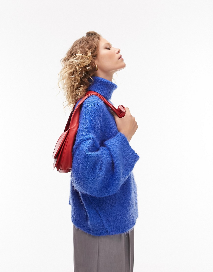 knitted fluffy roll neck sweater in blue