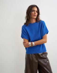 Model wearing Knitted fluffy short sleeve top with wool in cobalt blue