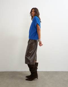 Model wearing Knitted fluffy short sleeve top with wool in cobalt blue