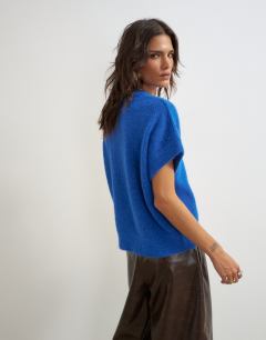 Model wearing Knitted fluffy short sleeve top with wool in cobalt blue
