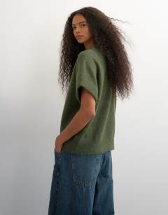 Model wearing Knitted fluffy short sleeve top with wool in khaki