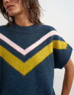 Model wearing Knitted fluffy short sleeve top with wool in multi stripe