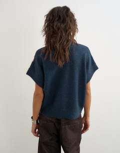 Model wearing Knitted fluffy short sleeve top with wool in multi stripe
