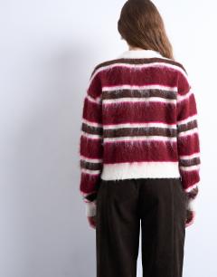 Model wearing Knitted fluffy stripe cardigan in pink