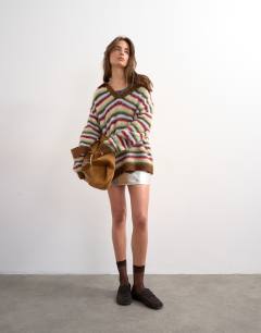 Model wearing Knitted fluffy stripe polo jumper in multi