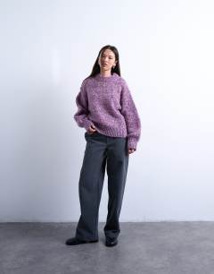 Model wearing Knitted fluffy twist yarn jumper in purple