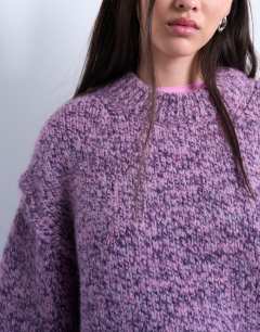 Model wearing Knitted fluffy twist yarn jumper in purple
