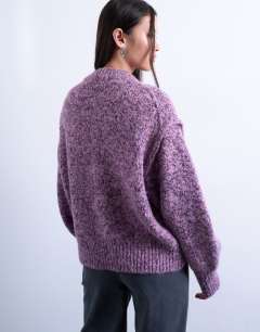 Model wearing Knitted fluffy twist yarn jumper in purple