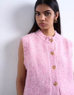 Model wearing Knitted fluffy twist yarn waistcoat in pink
