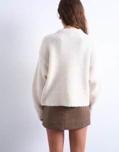 Model wearing Knitted fluffy ultimate jumper in cream 