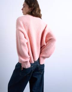 Model wearing Knitted fluffy ultimate jumper in pink