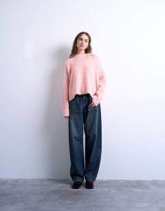 Model wearing Knitted fluffy ultimate jumper in pink