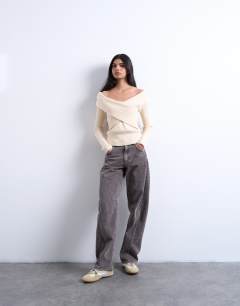 Model wearing Knitted foldover long sleeve top in ivory