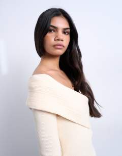 Model wearing Knitted foldover long sleeve top in ivory