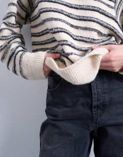 Model wearing Knitted forward seam stripe jumper in mono