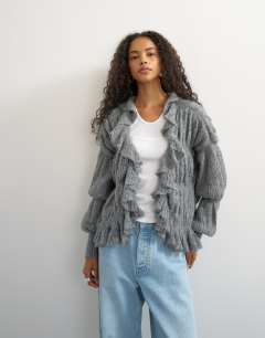 Model wearing Knitted frill trim hem cardigan with wool in grey