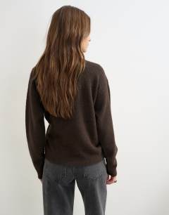 Model wearing Knitted front tie jumper with wool and alpaca in tobacco