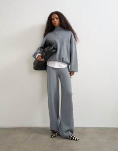 Model wearing Knitted funnel neck cinch hem co-ord jumper in grey